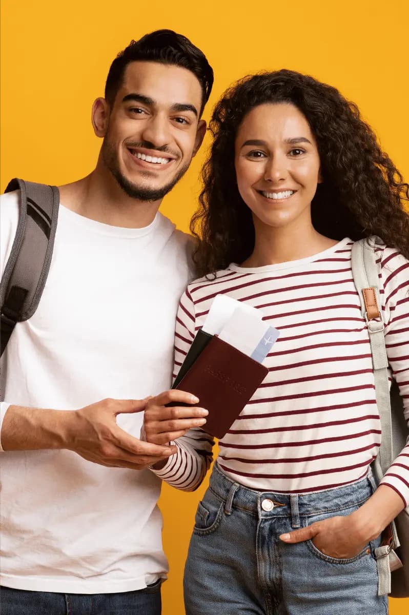 Happy couple with their flight reservations